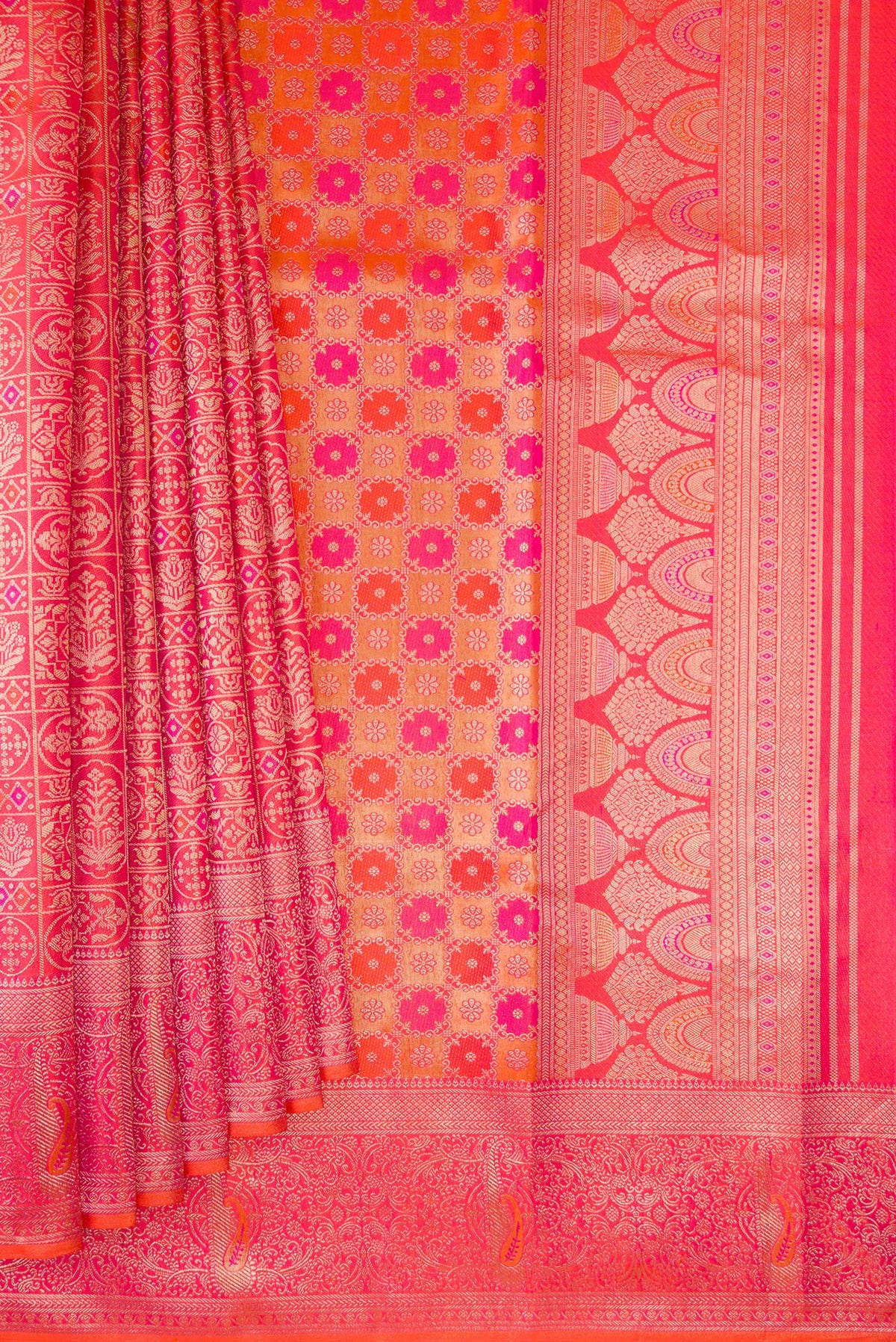 Pleats and pallu of Orange Dual Tone Kanjivaram Silk Saree with Zari Brocade on the body and Fancy Border. 