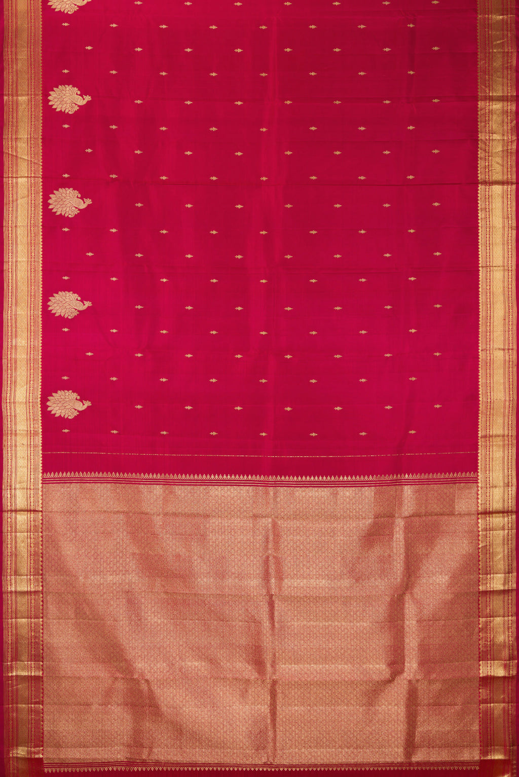 Flat view of Pure Silk Deep Red Kanjivaram Saree with Zari Butta on the body and Fancy Border. 