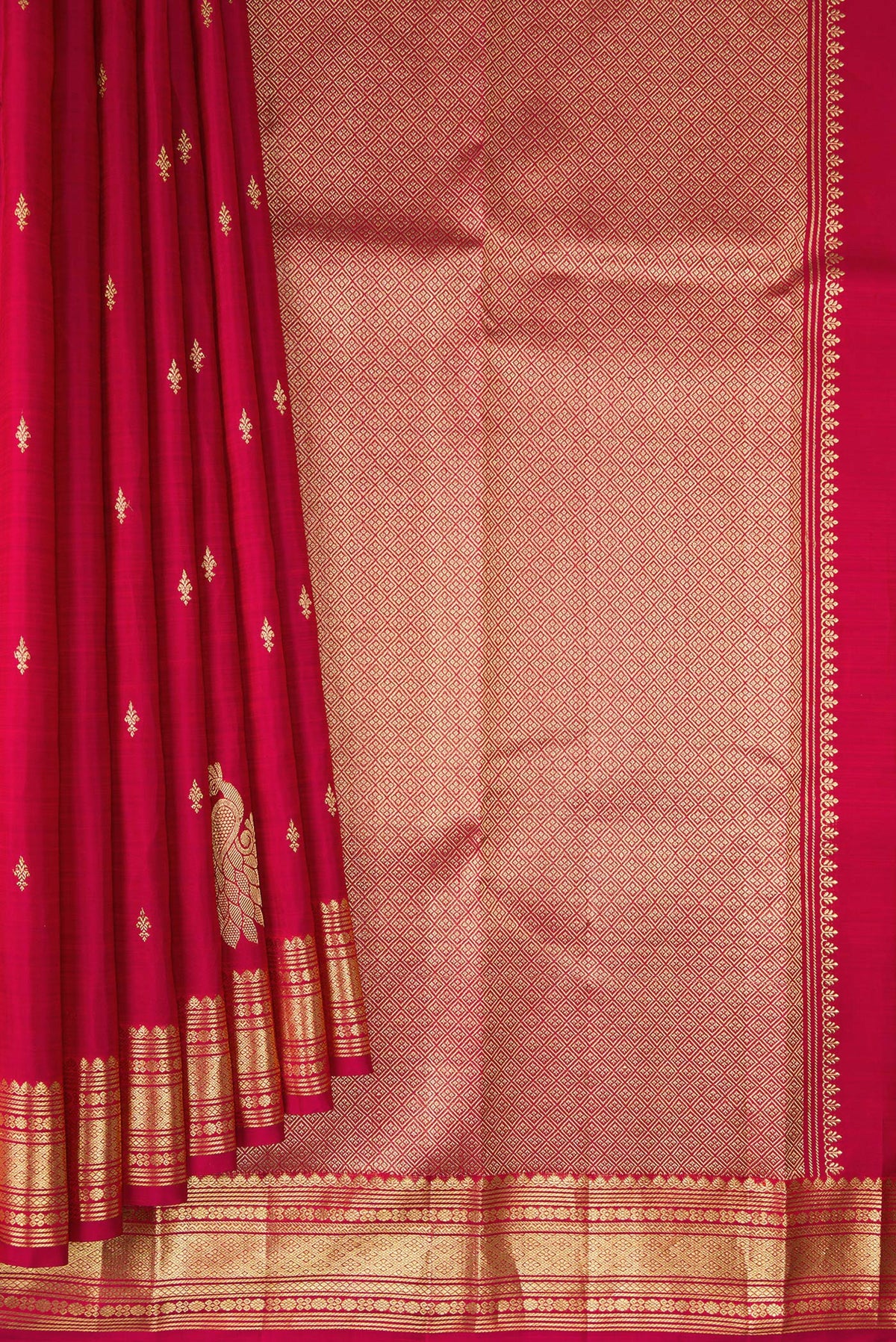 Pleats and pallu of Pure Silk Deep Red Kanjivaram Saree with Zari Butta on the body and Fancy Border. 