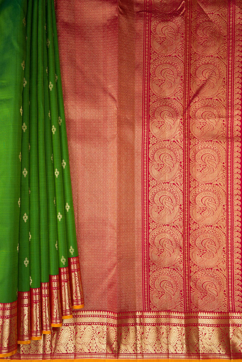 Pleats and pallu of Pure Silk Green Kanjivaram Saree with Zari Butta on the body and Zari Border. 