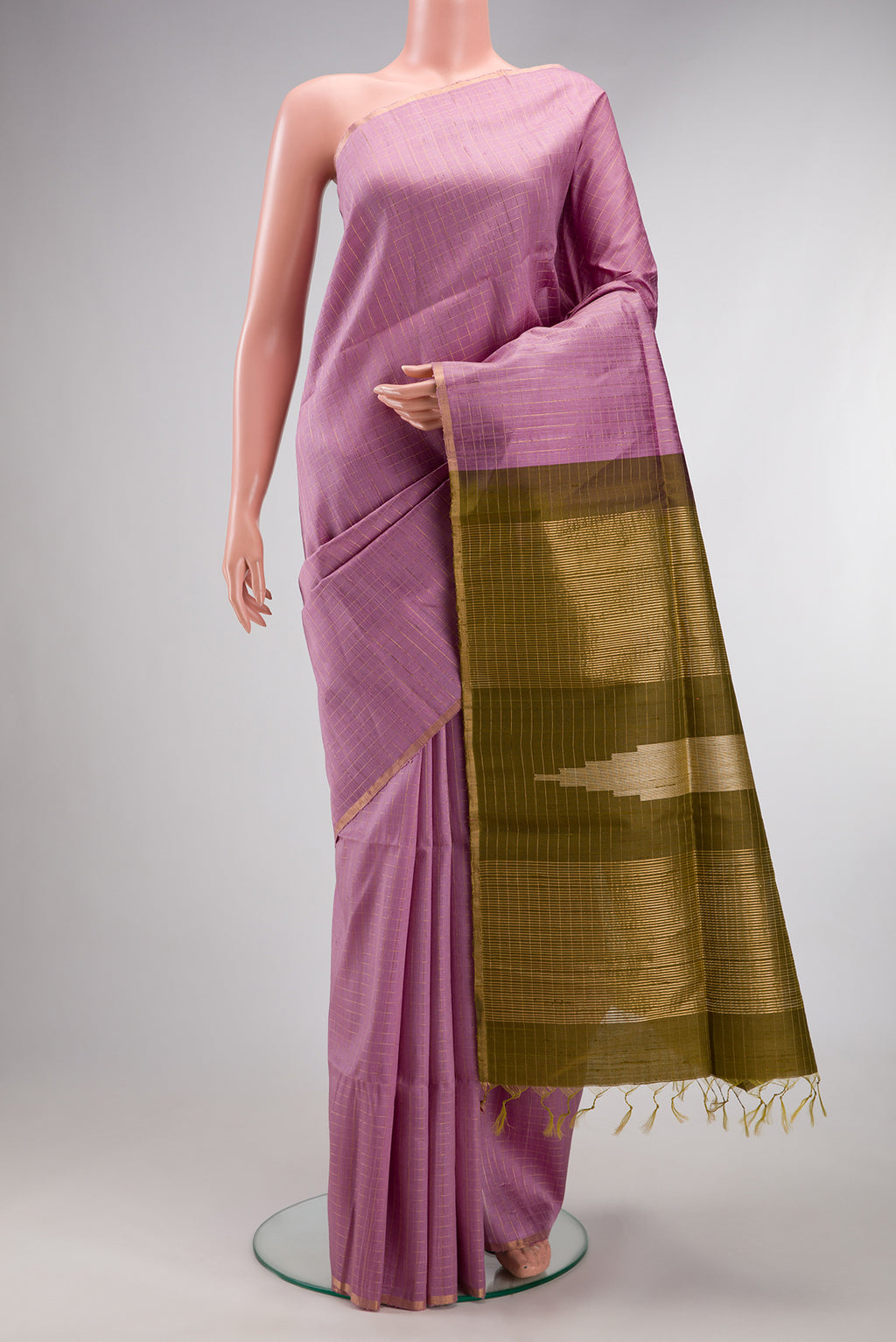 Pure Silk Lavender Raw Saree with Checked design on the body and Zari Border.  displayed on a mannequin