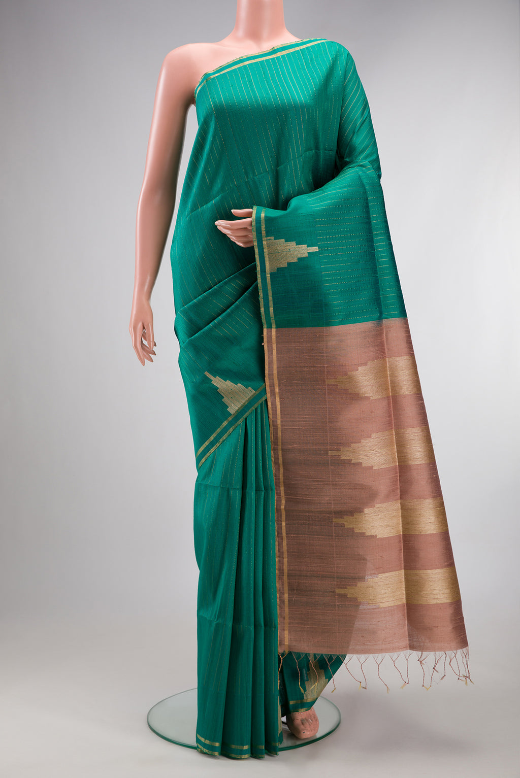 Pure Silk Teal Raw Saree with Stripes on the body and Fancy Border.  displayed on a mannequin