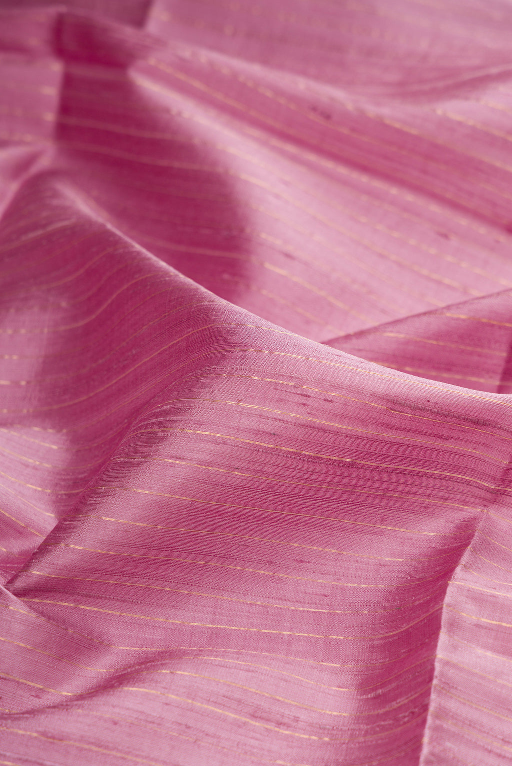 Close up of Pure Silk Purple Raw Saree with Stripes on the body and Fancy Border.  displaying folds
