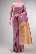 Pure Silk Purple Raw Saree with Stripes on the body and Fancy Border.  displayed on a mannequin