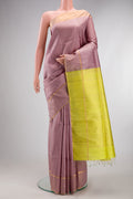 Pure Silk Rose Gold Raw Saree with Checked design on the body and Fancy Border.  displayed on a mannequin