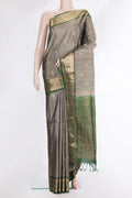 Pure Silk Grey Dual Tone Soft Saree with Zari Butta on the body and Fancy Border.  displayed on a mannequin