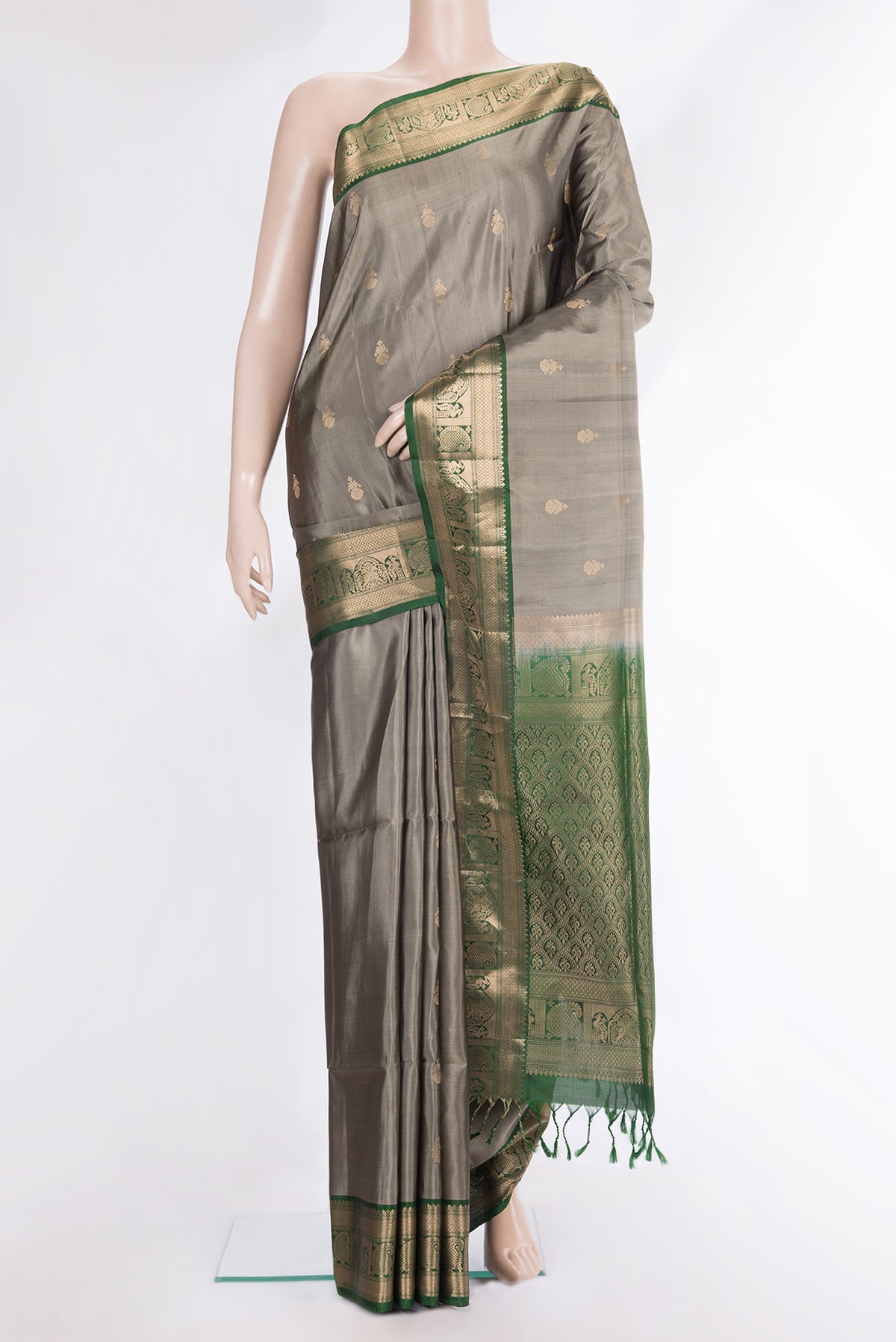 Pure Silk Grey Dual Tone Soft Saree with Zari Butta on the body and Fancy Border.  displayed on a mannequin