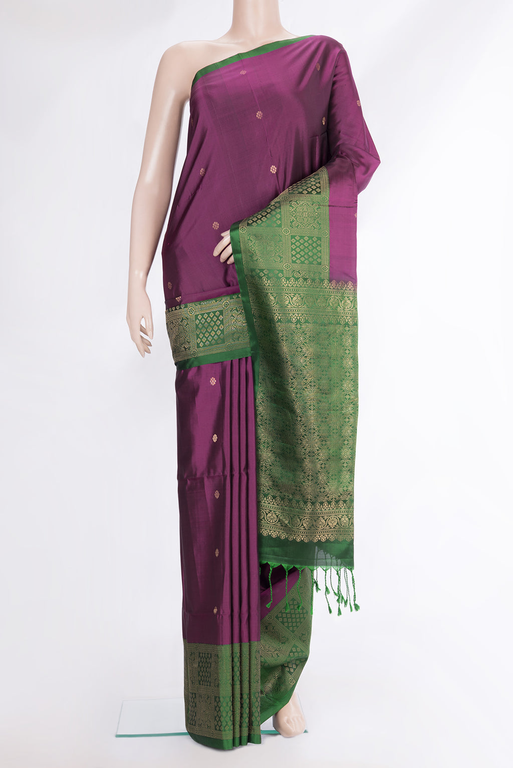 Pure Silk Magenta Dual Tone Soft Saree with Zari Butta on the body and Fancy Border.  displayed on a mannequin