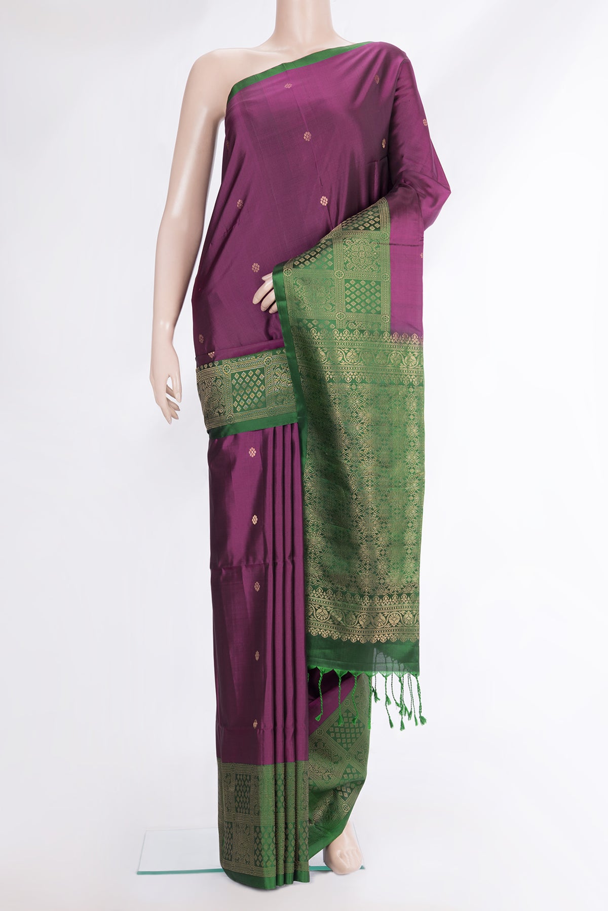 Pure Silk Magenta Dual Tone Soft Saree with Zari Butta on the body and Fancy Border.  displayed on a mannequin