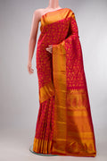 Pure Silk Red Kanchipuram Saree with Zari Brocade on the body and Zari Border.  displayed on a mannequin