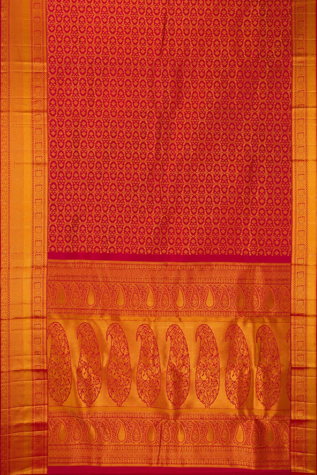 Flat view of Pure Silk Red Kanchipuram Saree with Zari Brocade on the body and Zari Border. 