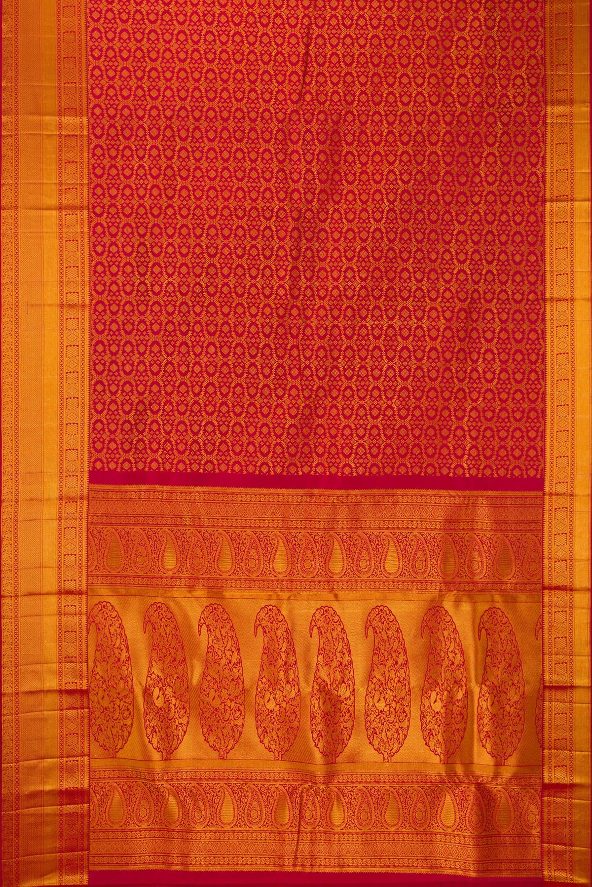 Flat view of Pure Silk Red Kanchipuram Saree with Zari Brocade on the body and Zari Border. 
