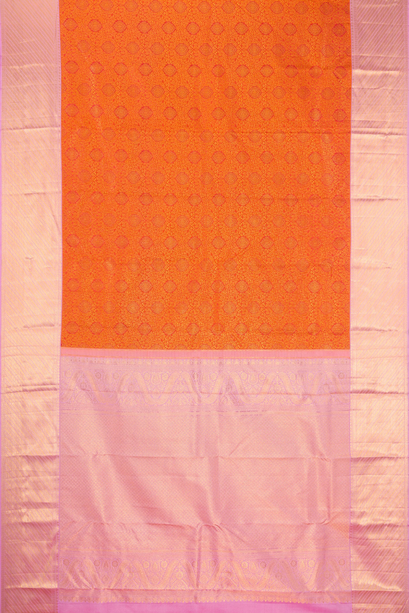 Flat view of Orange Kanjivaram Silk Saree with Zari Brocade on the body and Fancy Border. 