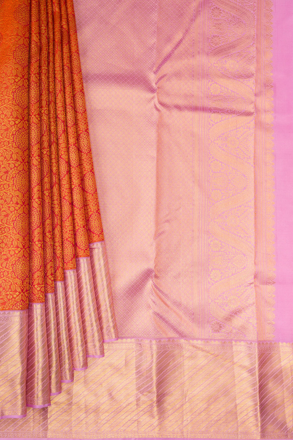 Pleats and pallu of Orange Kanjivaram Silk Saree with Zari Brocade on the body and Fancy Border. 