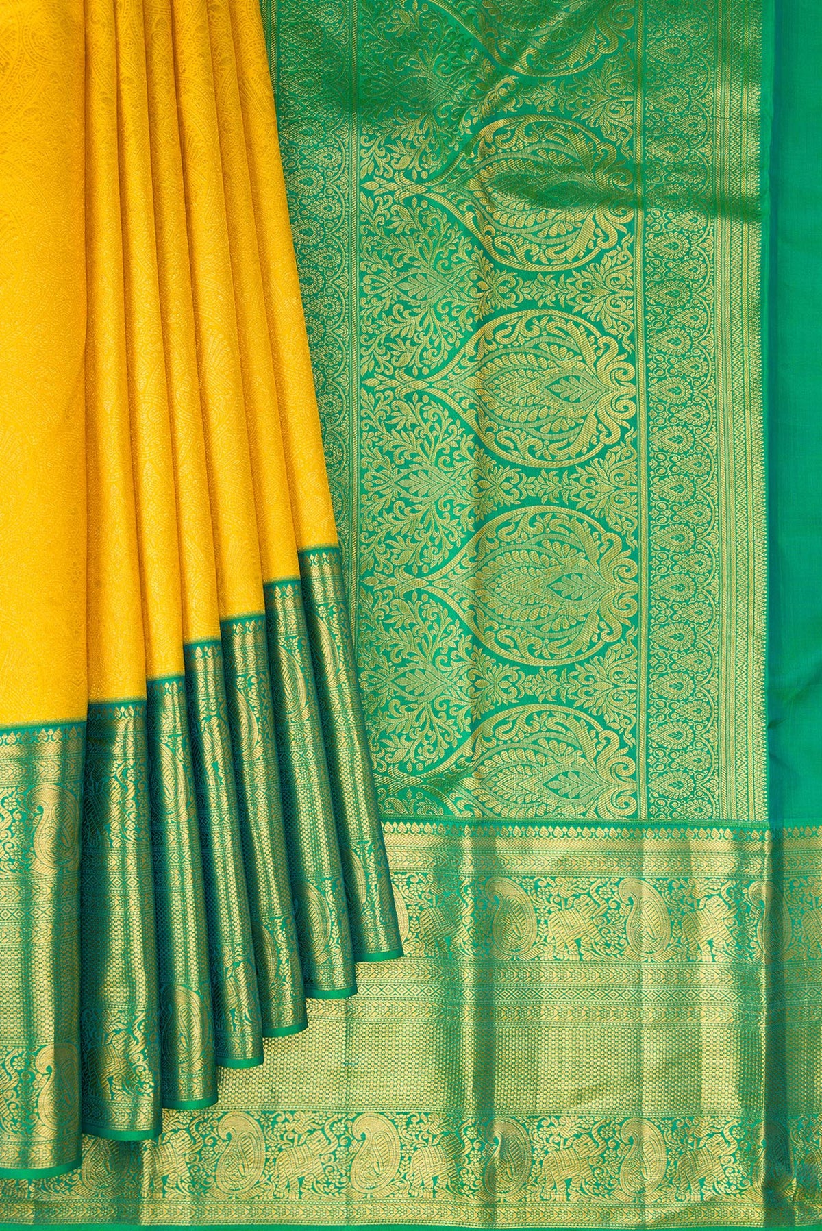 Pleats and pallu of Pure Silk Yellow Kanjivaram Saree with Zari Brocade on the body and Zari Border. 