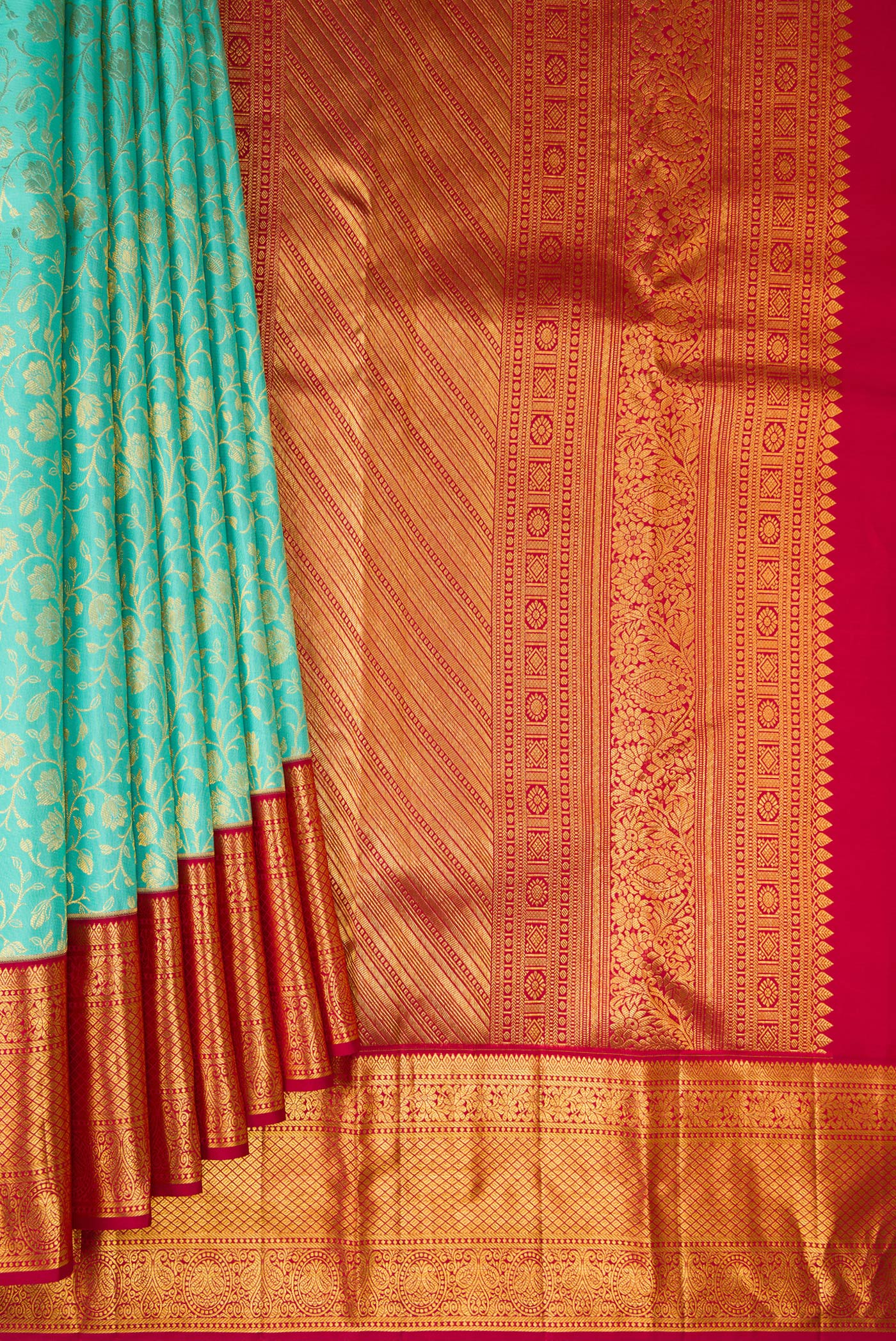 Pleats and pallu of Turquoise Kanjivaram Silk Saree with Zari Brocade on the body and Zari Border. 