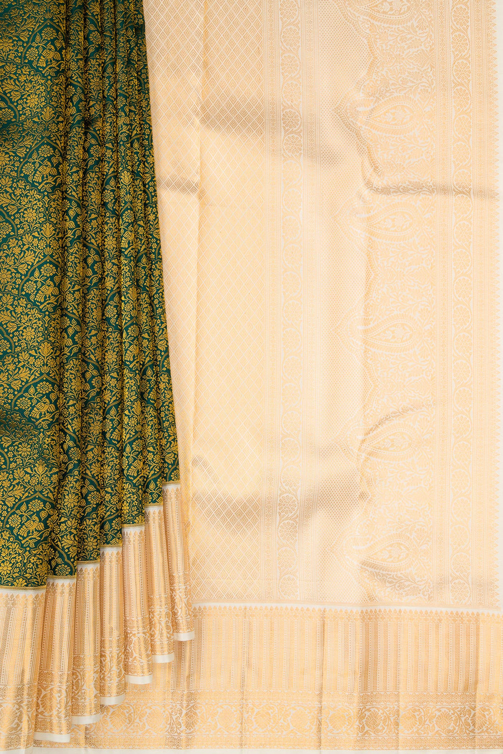 Pleats and pallu of Pure Silk Bottle Green Kanjivaram Saree with Zari Brocade on the body and Zari Border. 