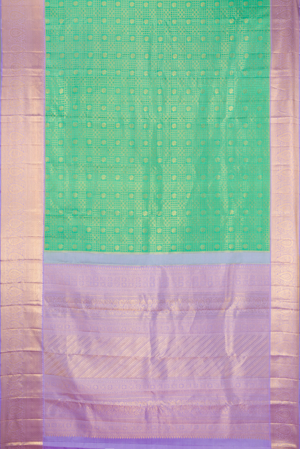 Flat view of Green Kanjivaram Silk Saree with Zari Brocade on the body and Zari Border. 