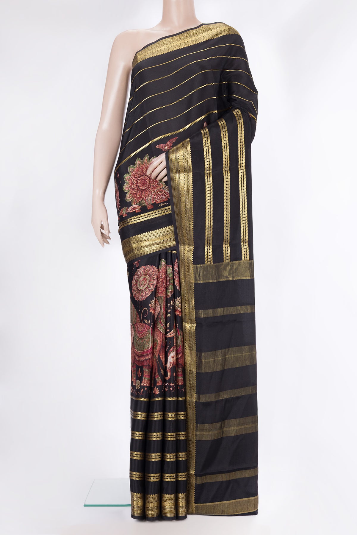 Pure Silk Black Dual Tone Mysore Silk Saree with Printed design on the body and Zari Border.  displayed on a mannequin