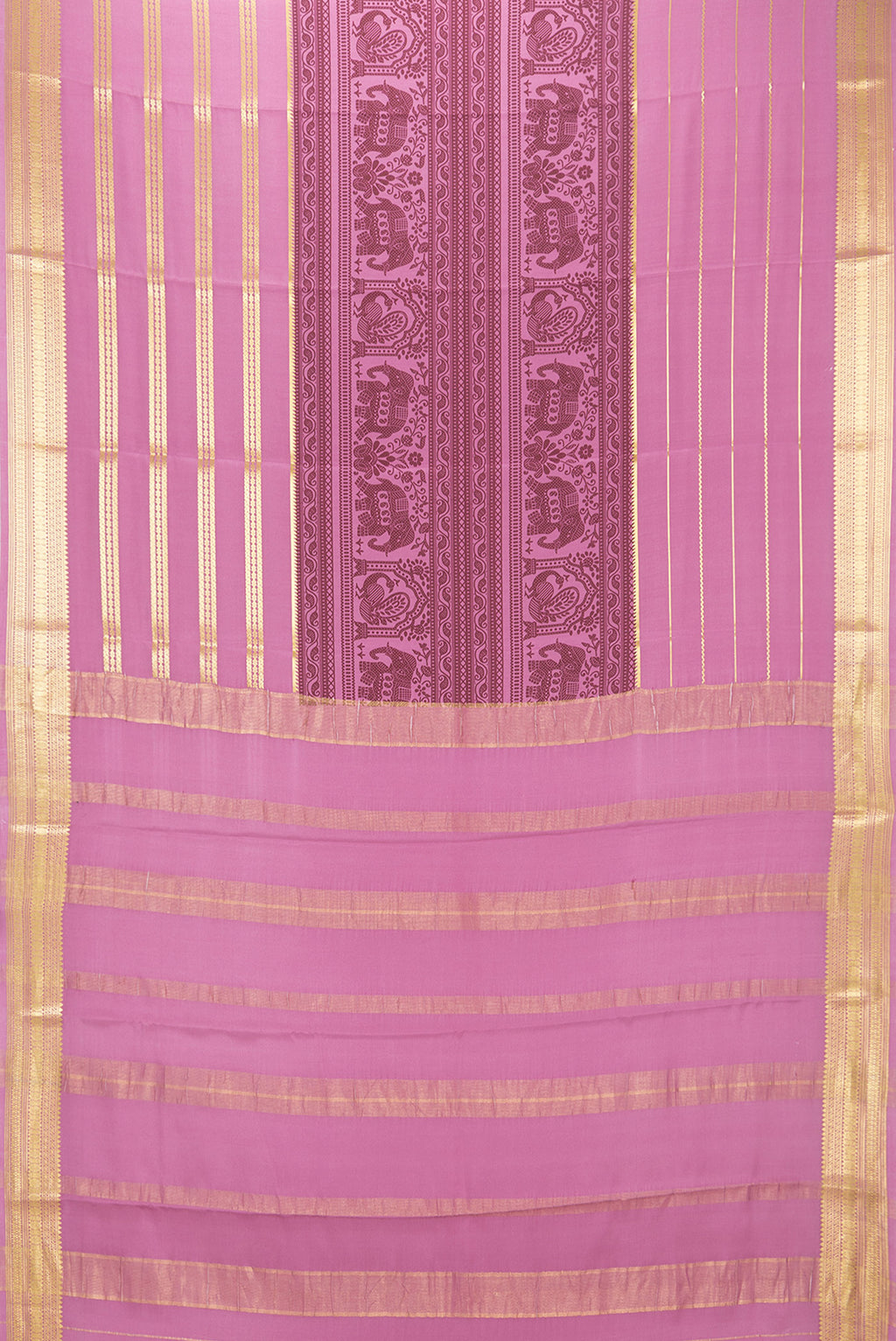 Flat view of Light Magenta Mysore Crepe Saree with Printed design on the body and Zari Border. 