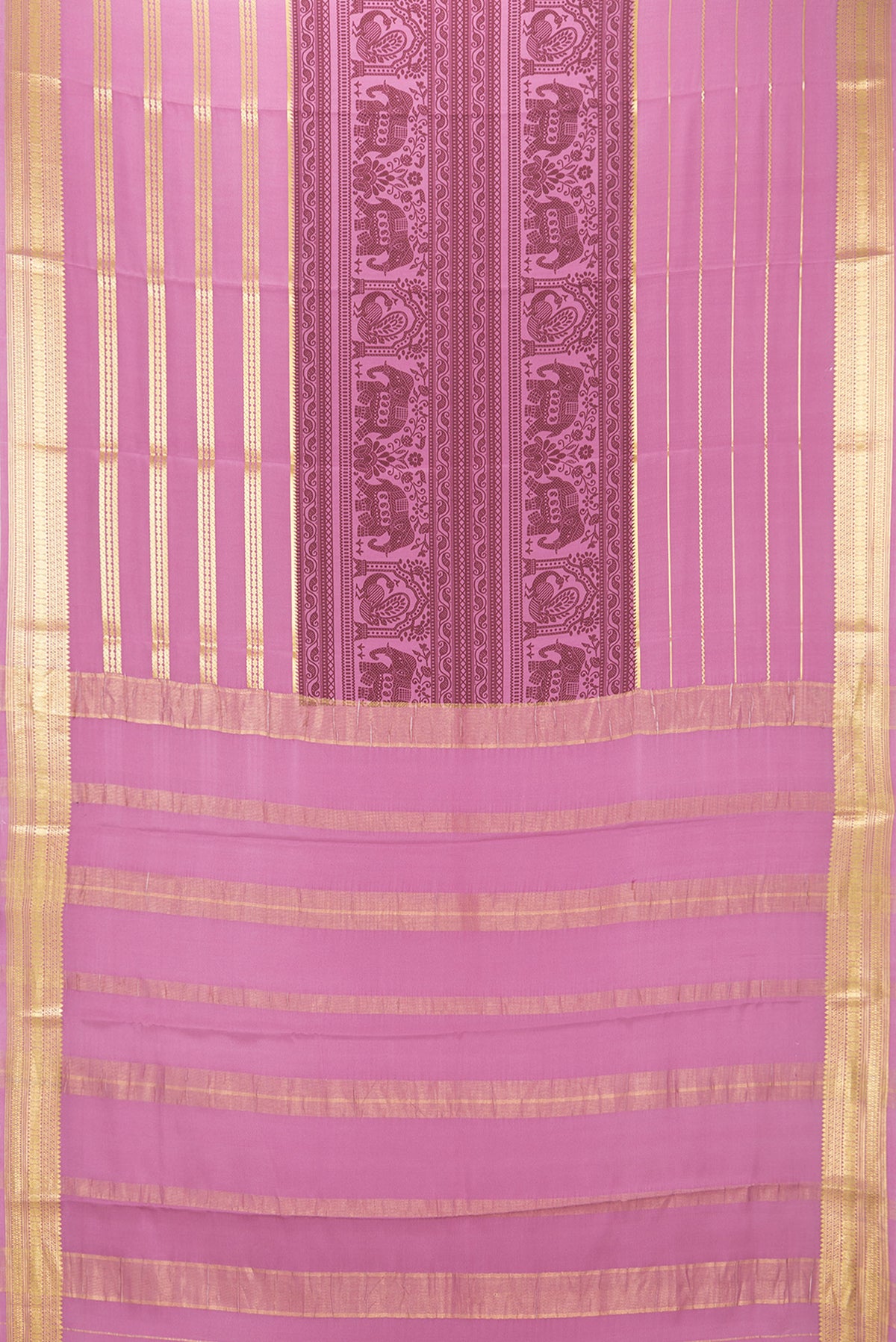 Flat view of Light Magenta Mysore Crepe Saree with Printed design on the body and Zari Border. 