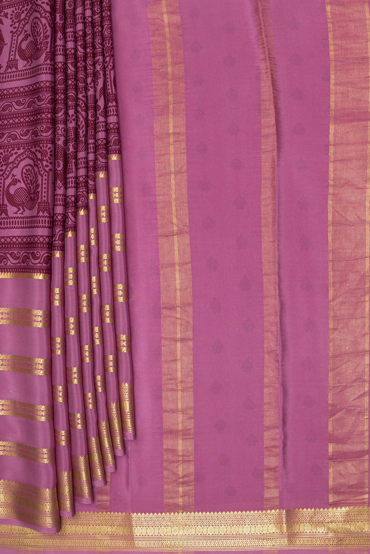 Pleats and pallu of Light Magenta Mysore Crepe Saree with Printed design on the body and Zari Border. 