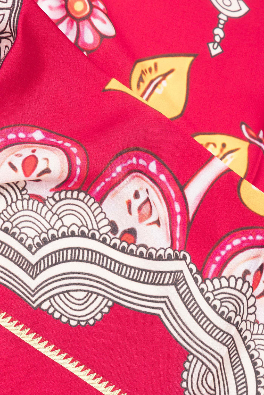 Close up of Red Mysore Crepe Saree with Printed design on the body and Zari Border.  displaying folds