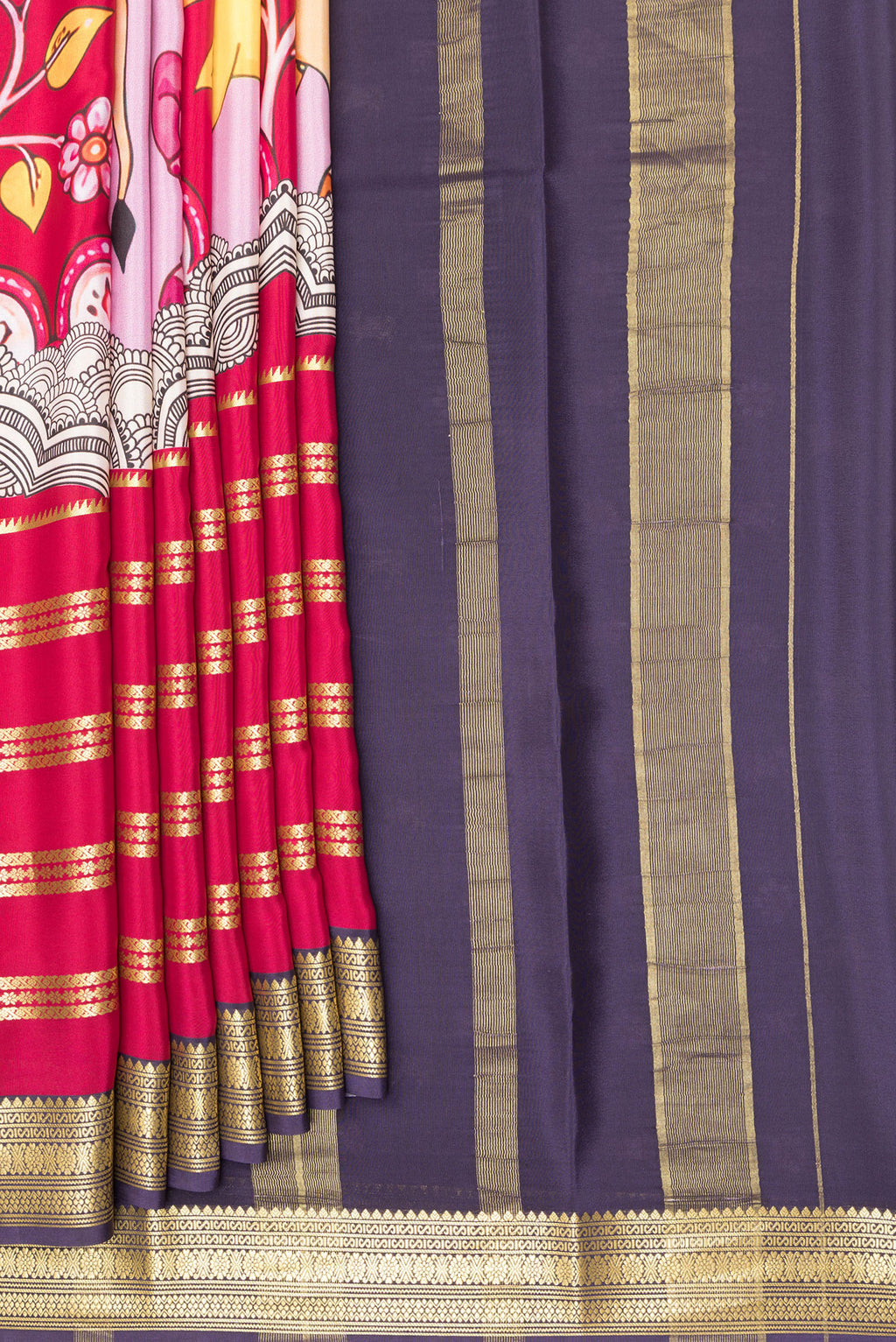 Pleats and pallu of Red Mysore Crepe Saree with Printed design on the body and Zari Border. 