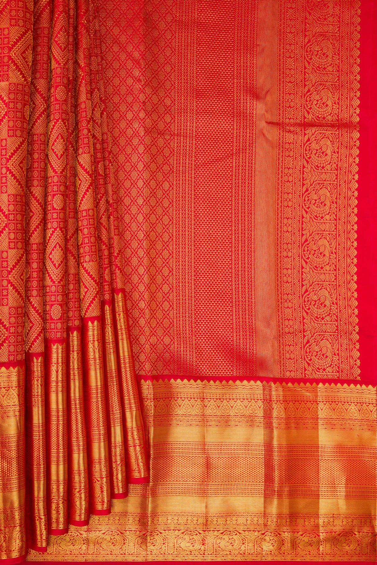 Pleats and pallu of Pure Silk Red Kanchipuram Saree with Zari Brocade on the body and Zari Border. 