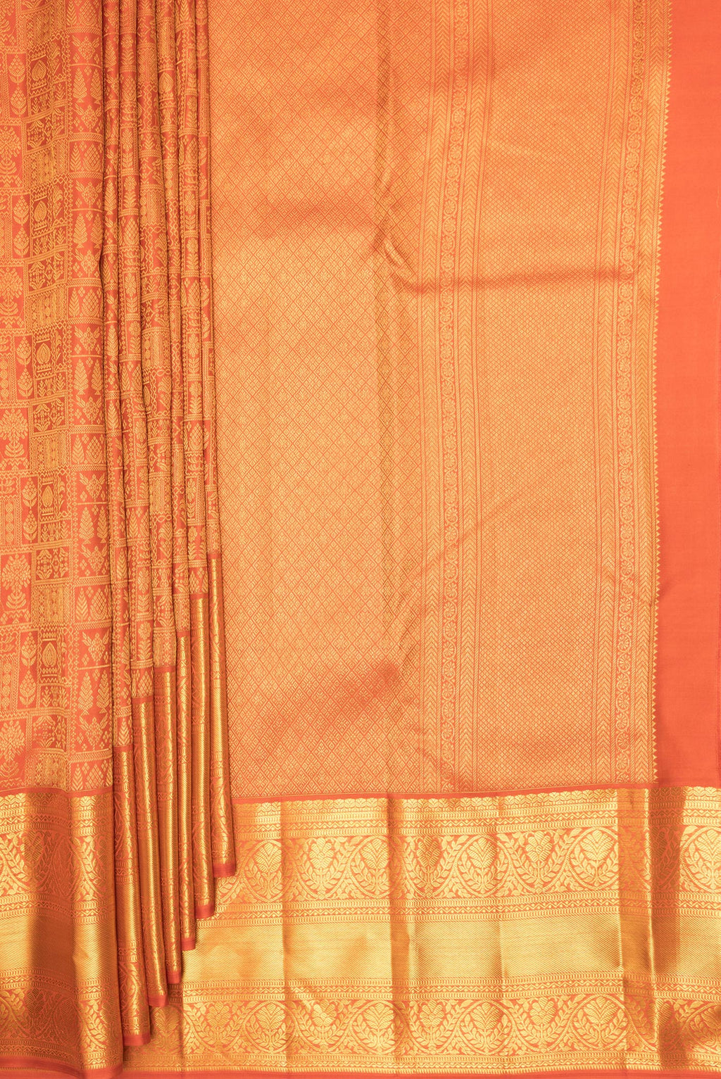 Pleats and pallu of Pure Silk Orange Kanchipuram Saree with Zari Brocade on the body and Fancy Border. 