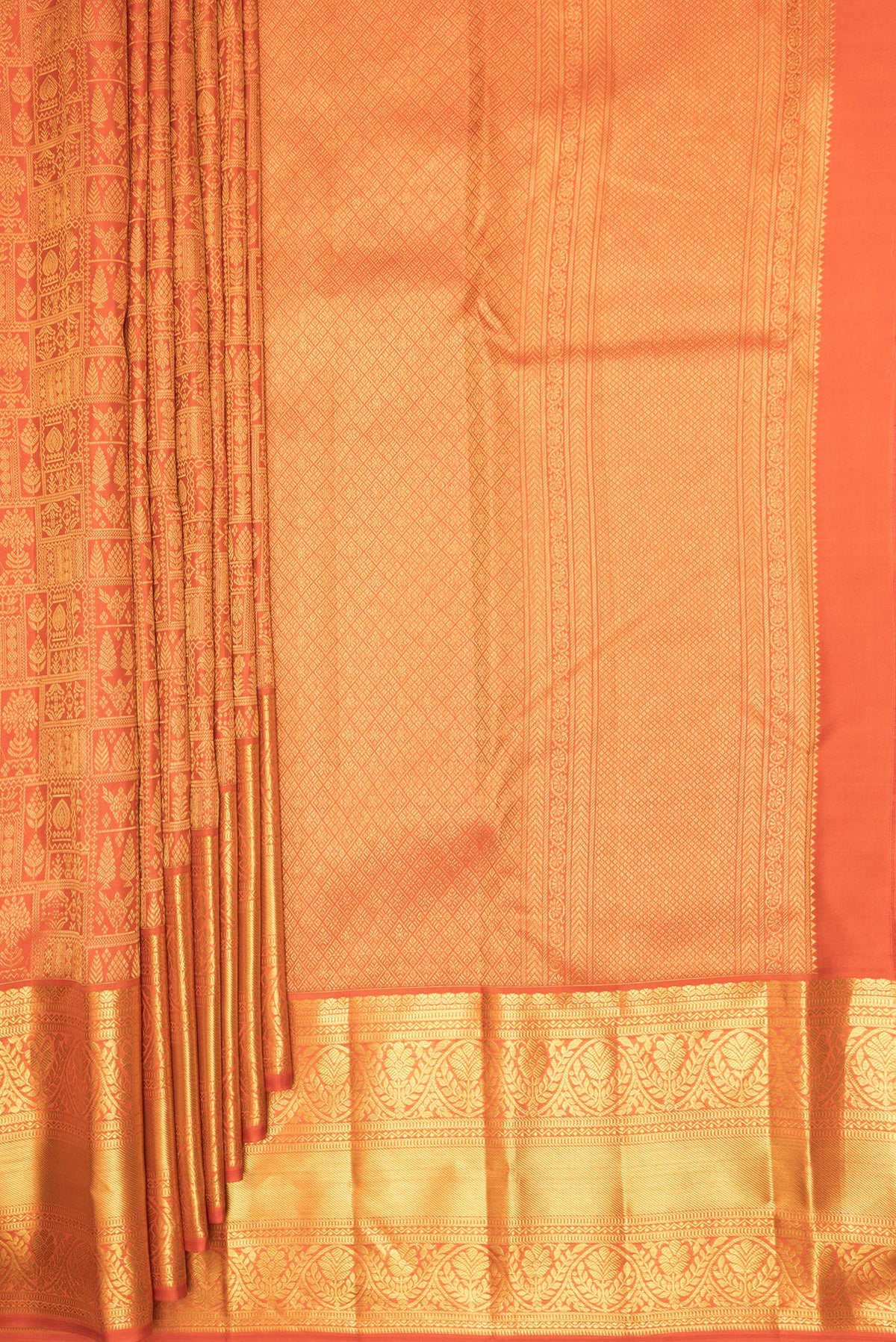 Pleats and pallu of Pure Silk Orange Kanchipuram Saree with Zari Brocade on the body and Fancy Border. 
