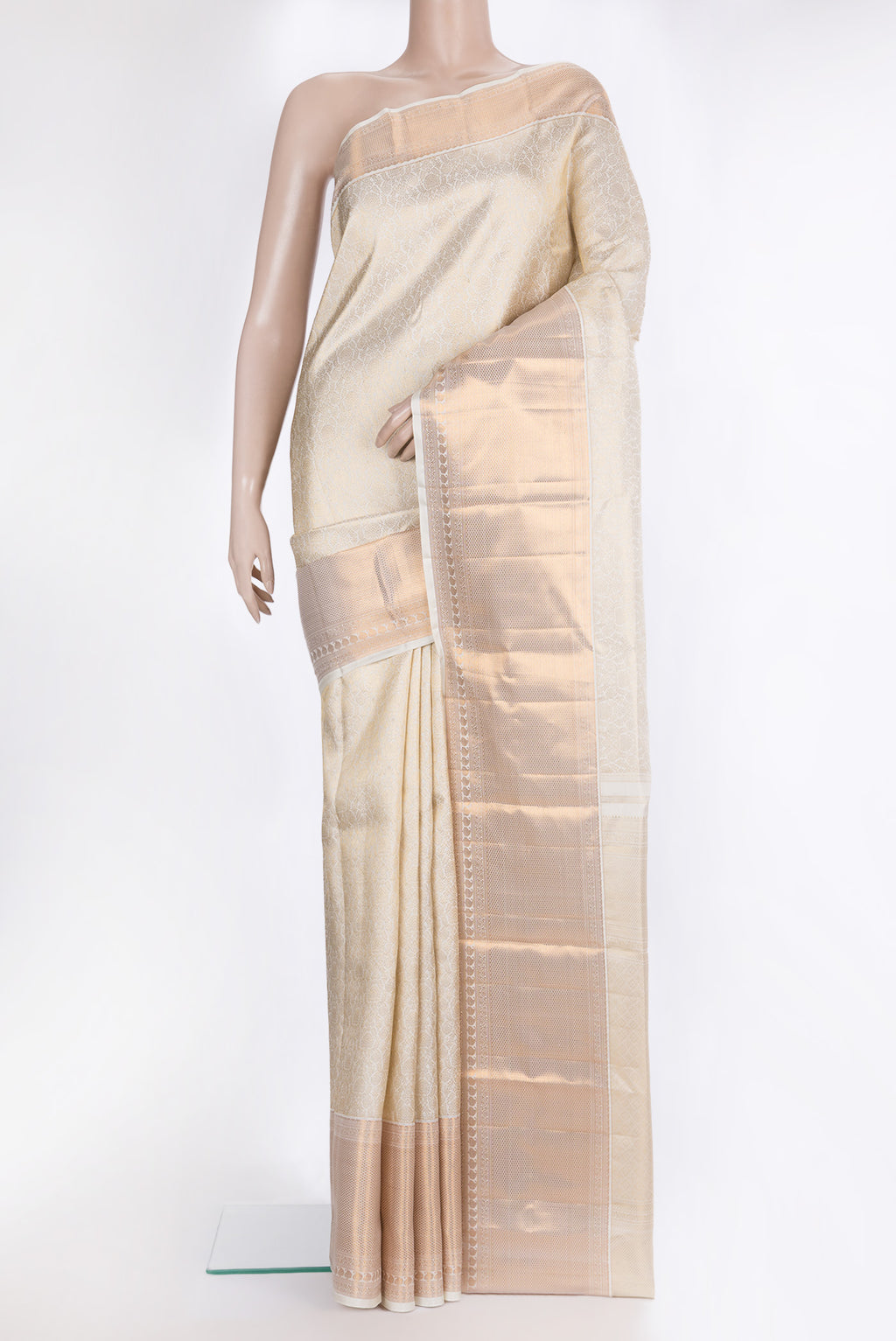 Pure Silk Off White Kanchipuram Saree with Zari Brocade on the body and Zari Border.  displayed on a mannequin