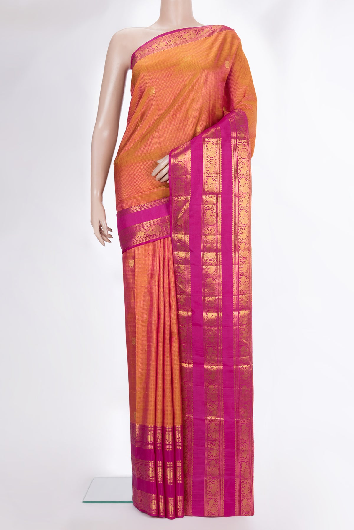 Pure Silk Mustard Dual Tone Kanjivaram Saree with Checked design on the body and Zari Border.  displayed on a mannequin