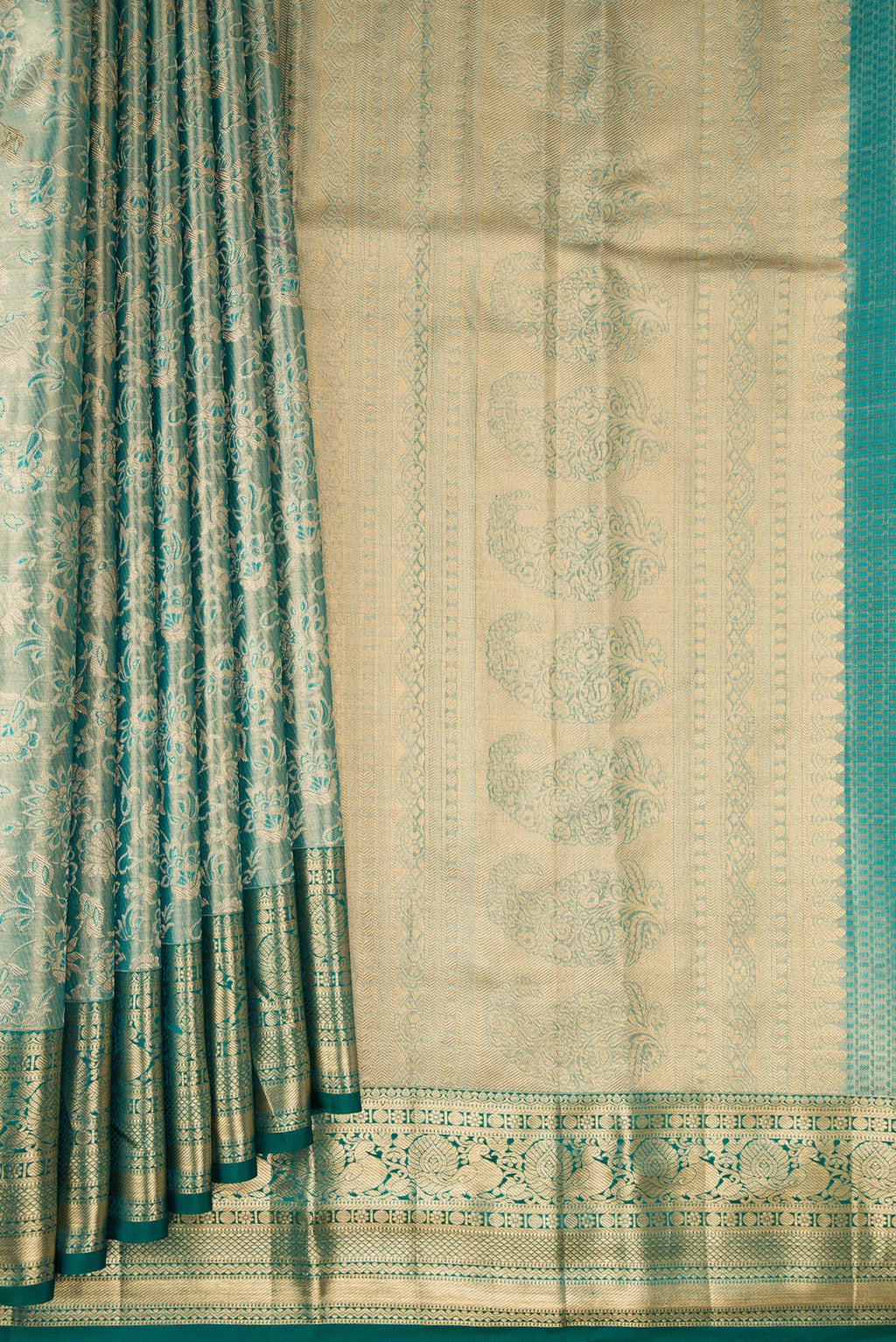Pleats and pallu of Sea Green Dual Tone Kanchipuram Tissue Saree with Zari Brocade on the body and Zari Border. 