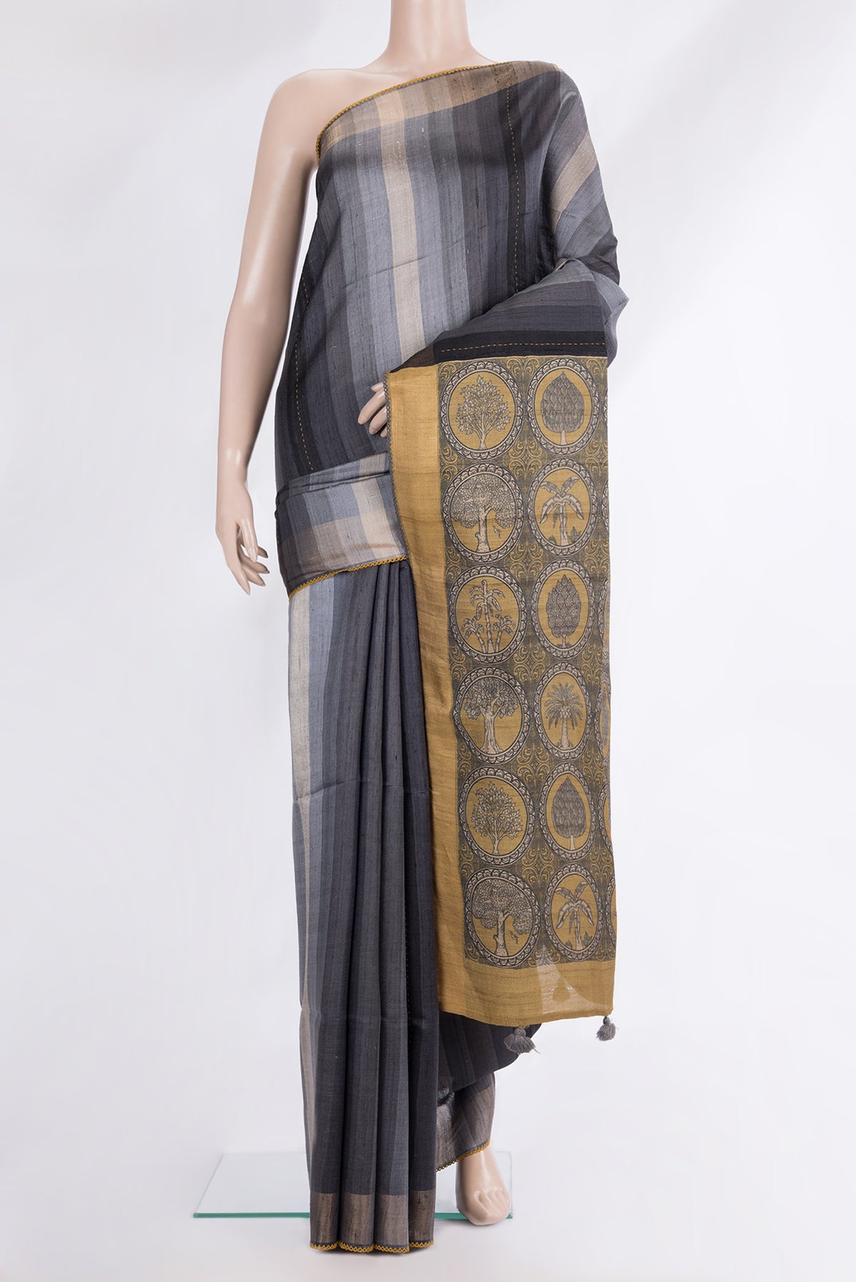 Pure Silk Grey Dual Tone Tussar Saree with Stripes on the body and Embroidery Border.  displayed on a mannequin
