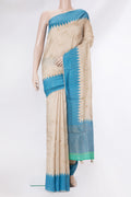 Pure Silk Beige Dual Tone Tussar Saree with Embroidery on the body and Embroidery Border.  displayed on a mannequin