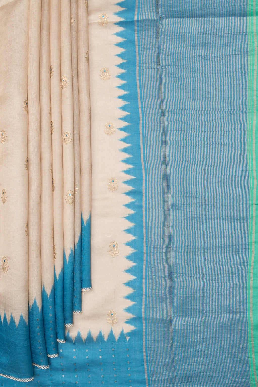 Pleats and pallu of Pure Silk Beige Dual Tone Tussar Saree with Embroidery on the body and Embroidery Border. 