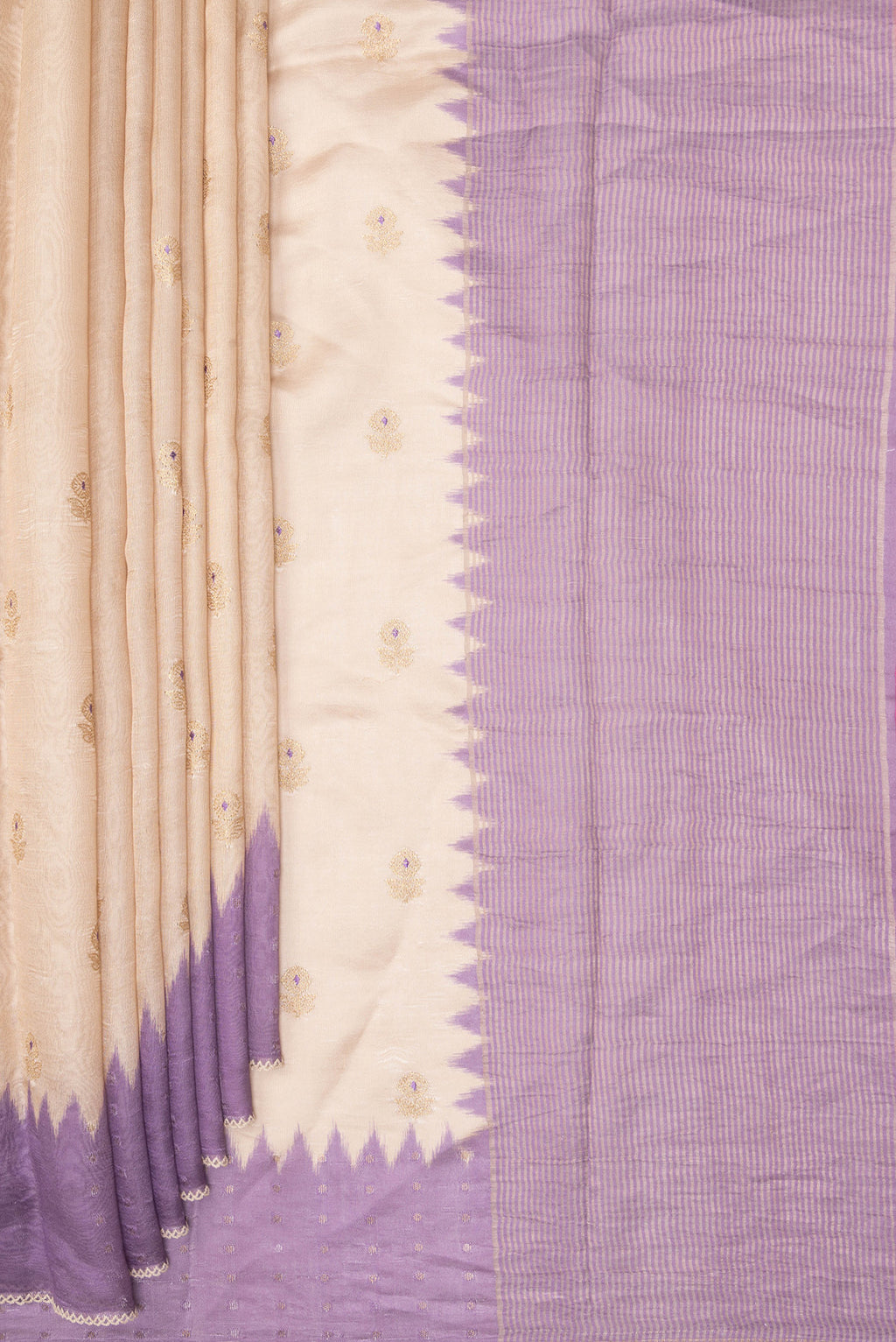 Pleats and pallu of Pure Silk Beige Dual Tone Tussar Saree with Embroidery on the body and Embroidery Border. 