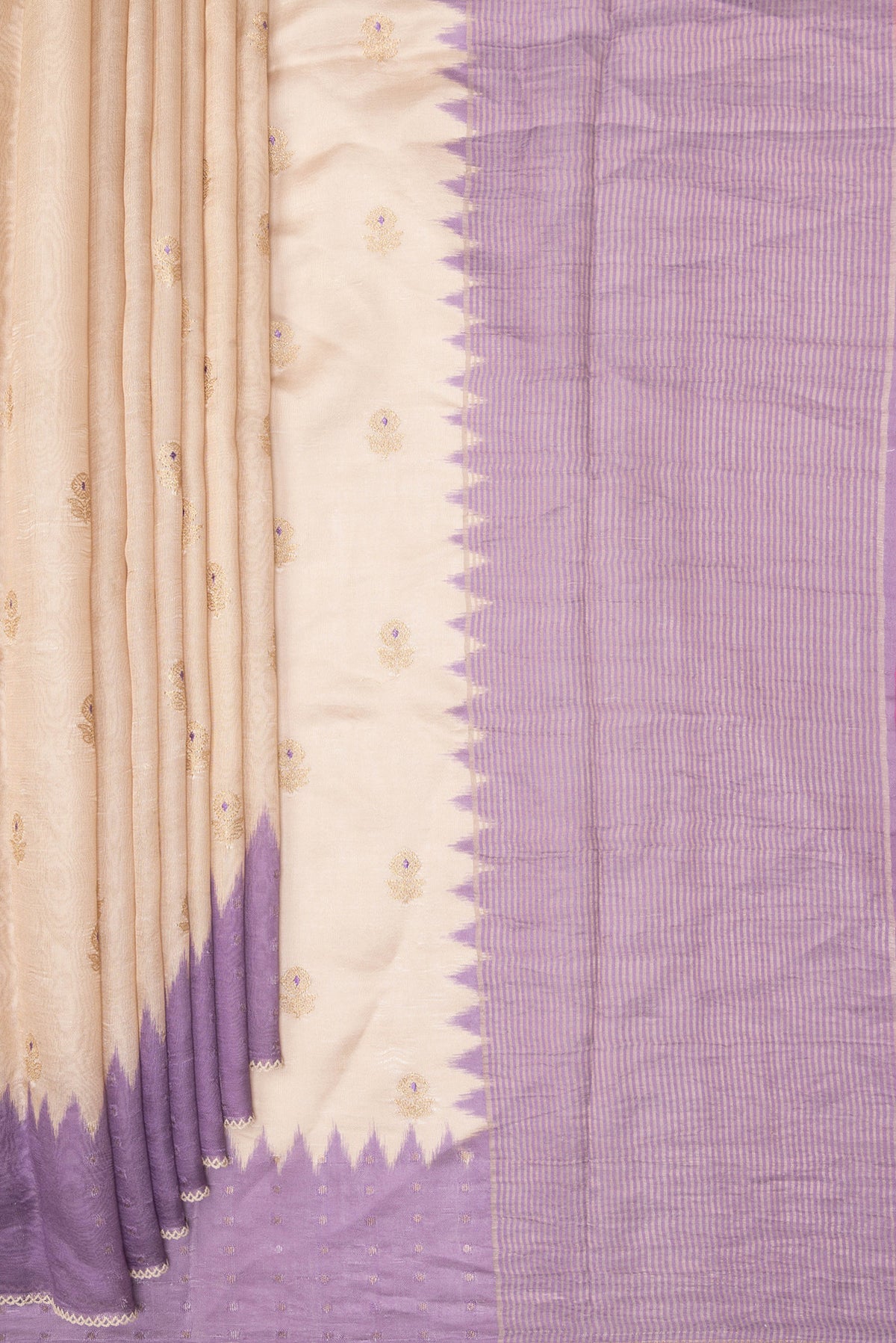 Pleats and pallu of Pure Silk Beige Dual Tone Tussar Saree with Embroidery on the body and Embroidery Border. 