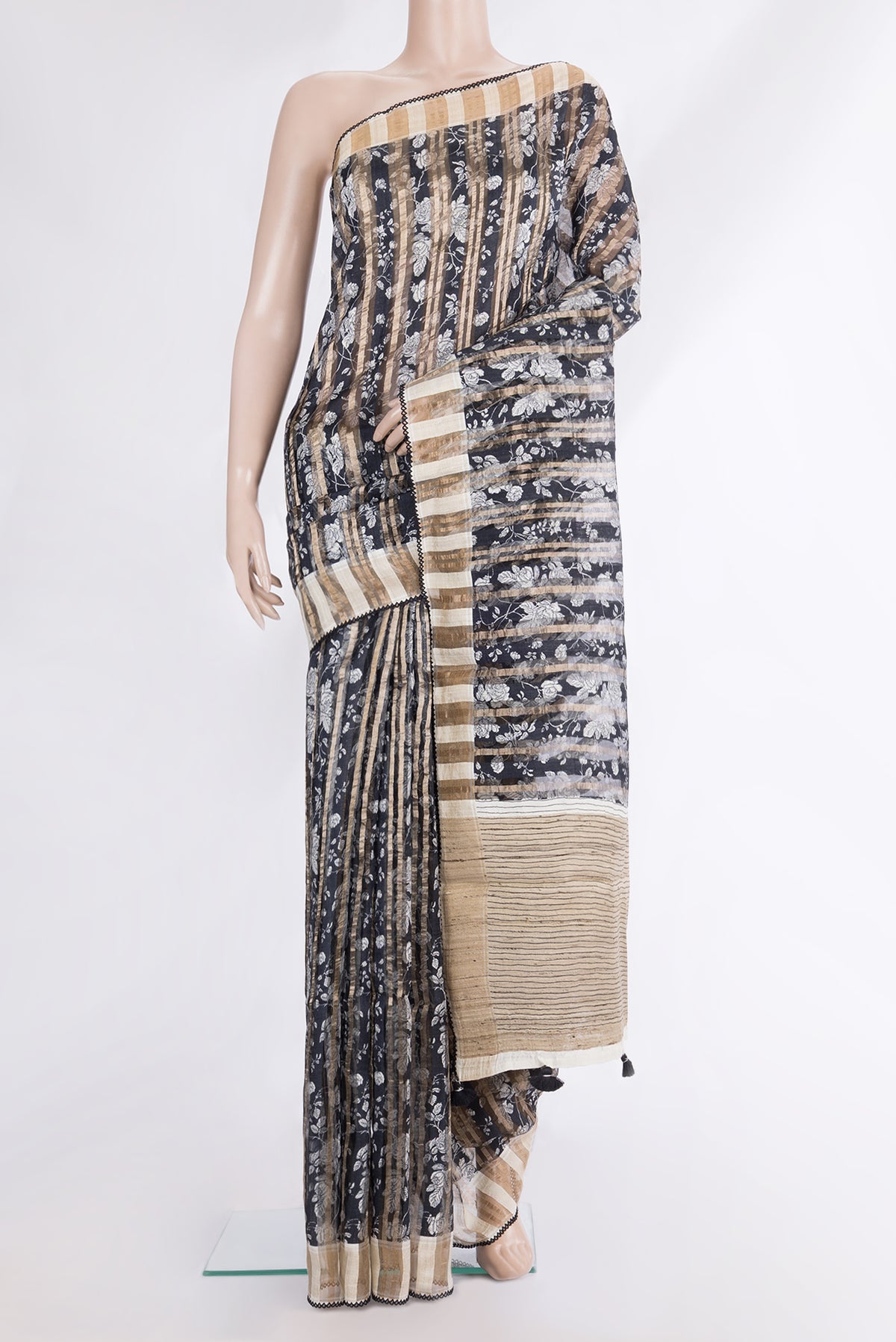 Pure Silk Navy Blue Dual Tone Tussar Saree with Printed design on the body and Fancy Border.  displayed on a mannequin