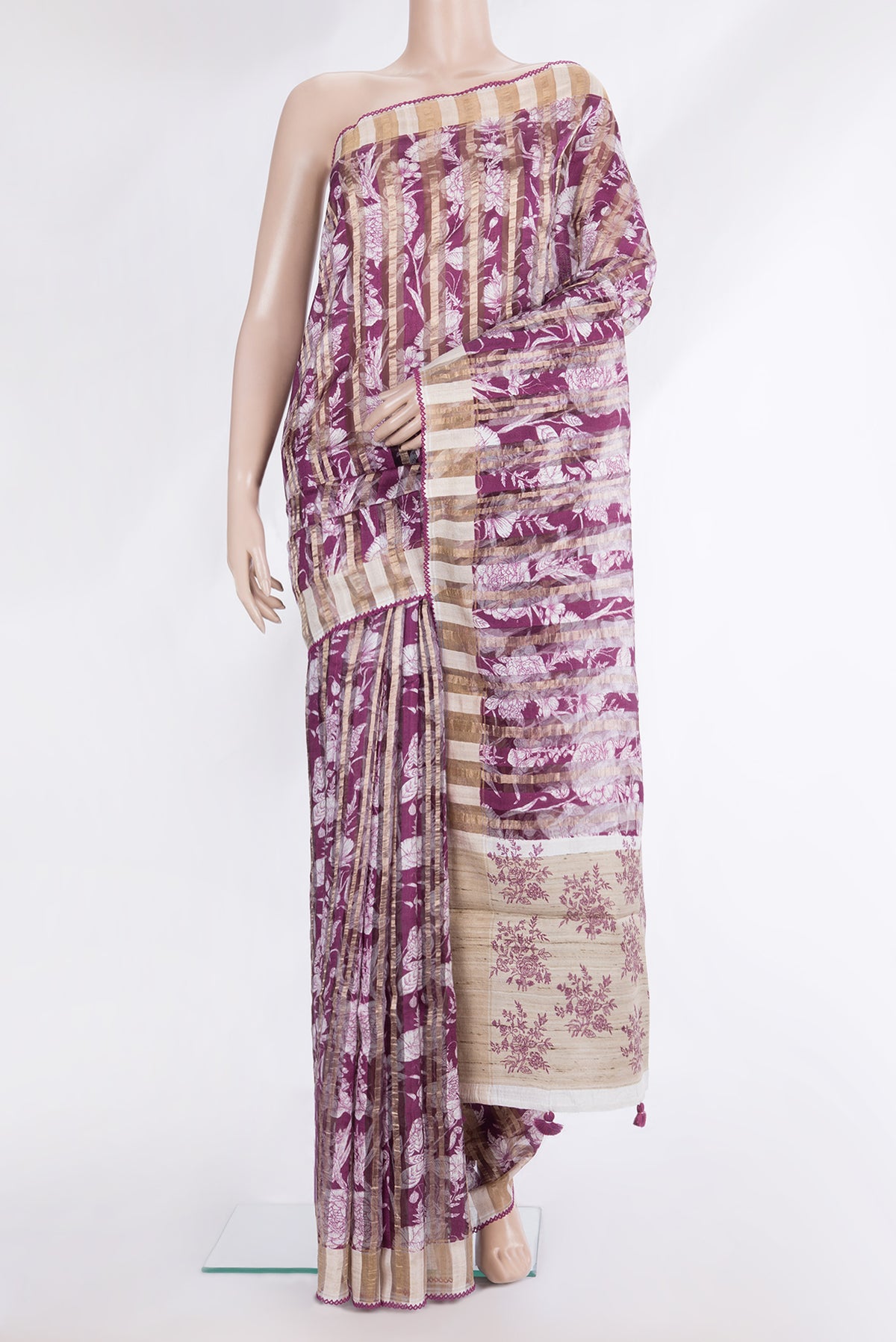 Pure Silk Magenta Dual Tone Tussar Saree with Printed design on the body and Fancy Border.  displayed on a mannequin
