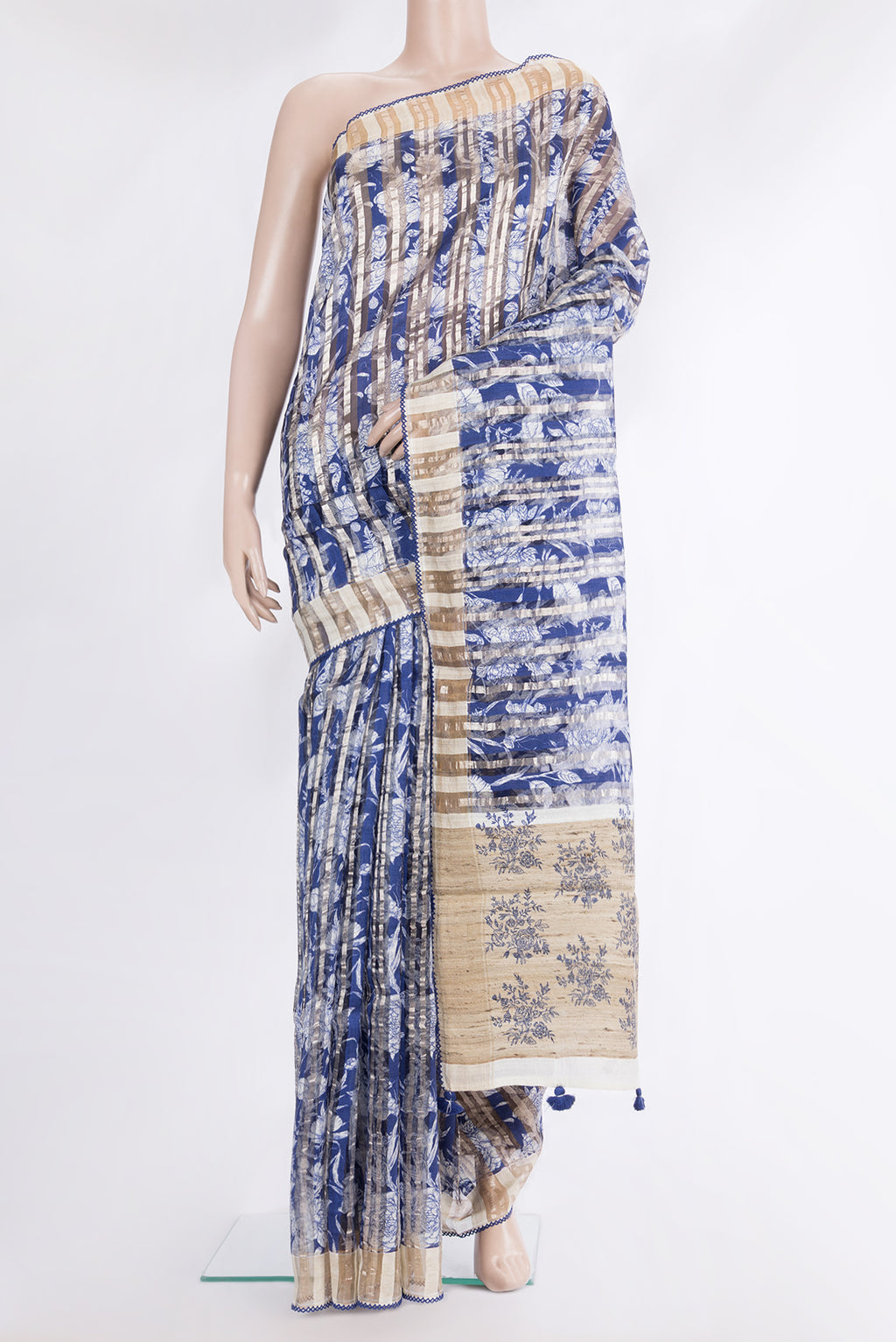 Pure Silk Royal Blue Dual Tone Tussar Saree with Printed design on the body and Fancy Border.  displayed on a mannequin