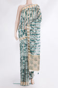 Pure Silk Green Dual Tone Tussar Saree with Printed design on the body and Fancy Border.  displayed on a mannequin
