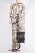 Pure Silk Off White Dual Tone Tussar Saree with Printed design on the body and Fancy Border.  displayed on a mannequin