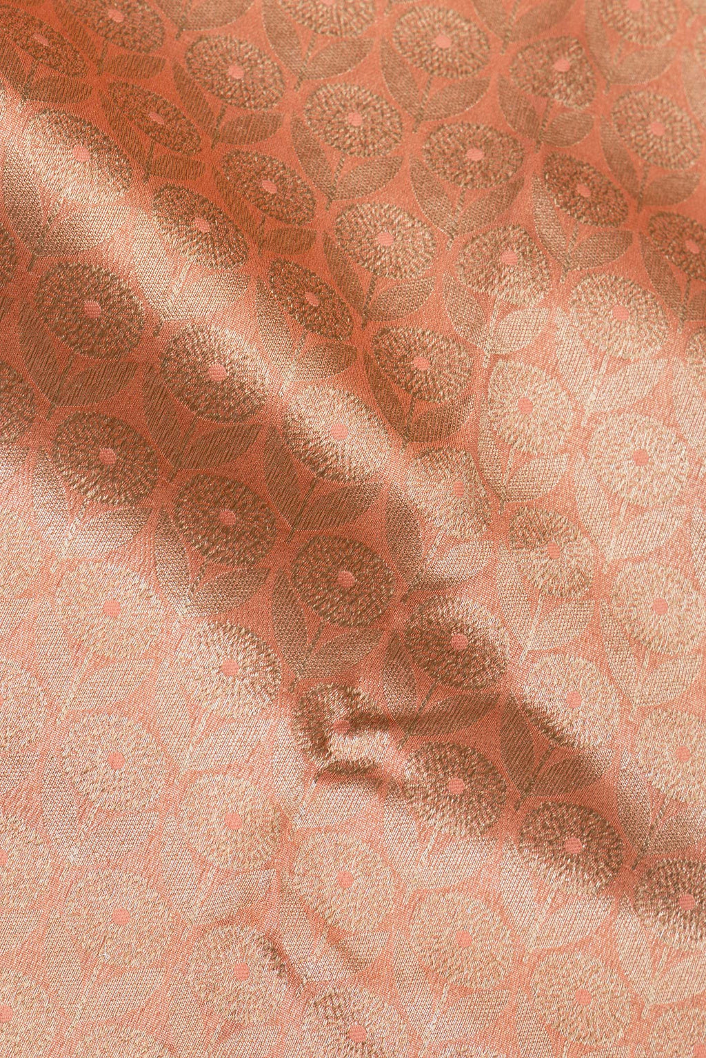 Close up of Pure Silk Golden Peach Dual Tone Chanderi Saree with Zari Brocade on the body and Zari Border.  displaying folds