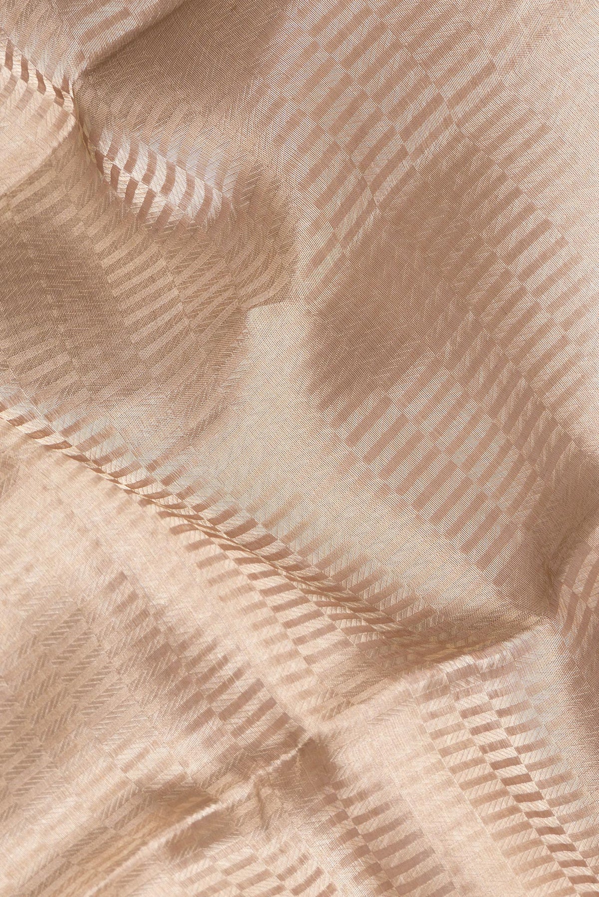 Close up of Pure Silk Brown Dual Tone Banarasi Saree with Zari Brocade on the body and Fancy Border.  displaying folds