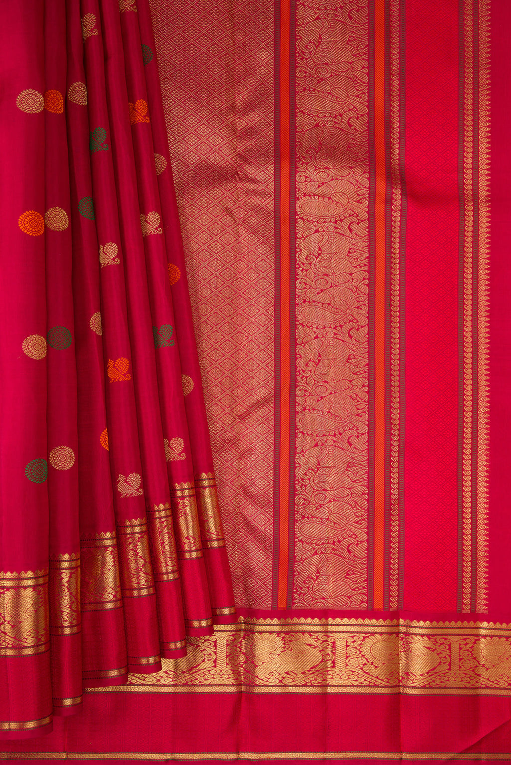 Pleats and pallu of Pure Silk Pure Zari Deep Red Kanjivaram Saree with Zari And Thread Butta on the body and Zari Border. 