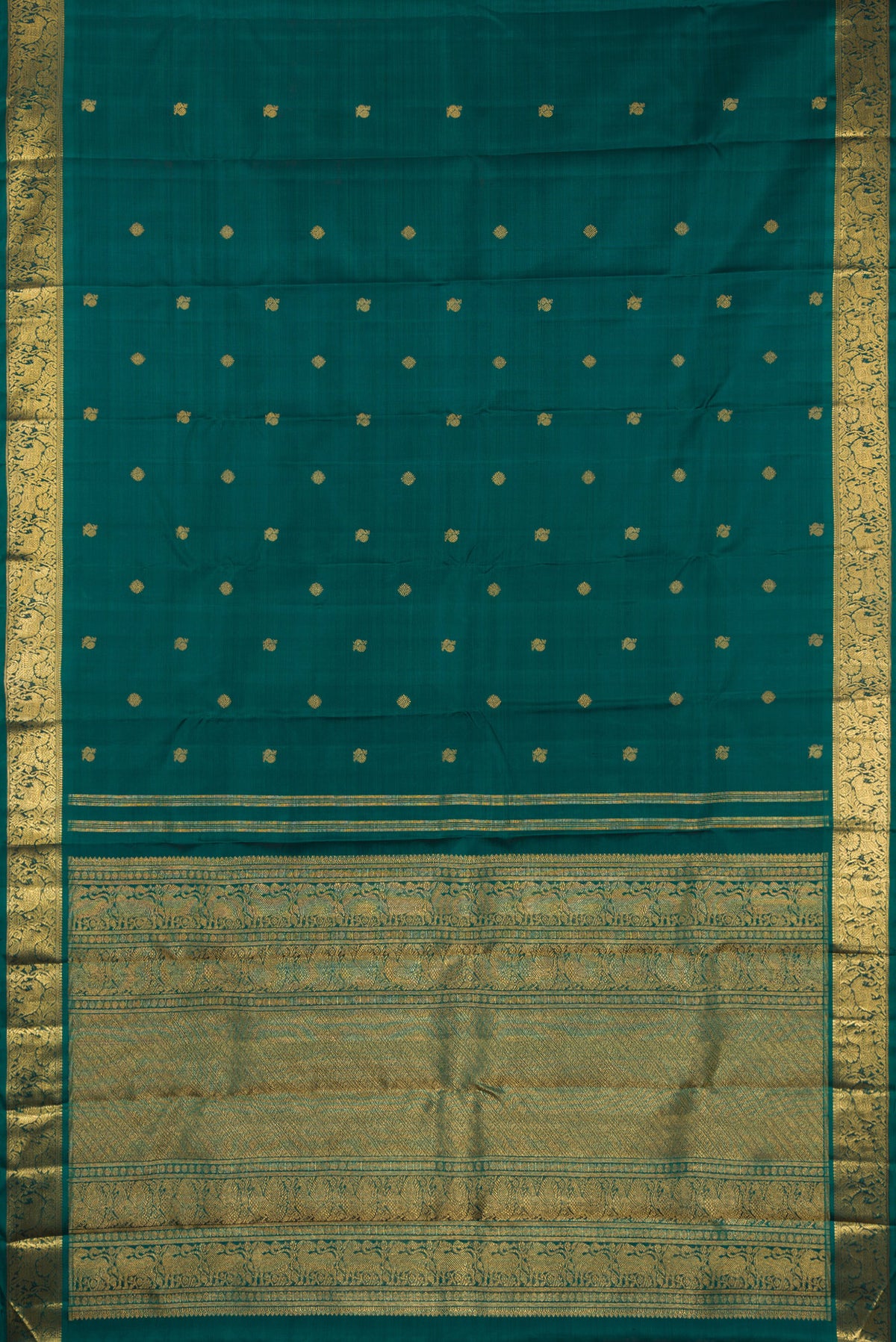 Flat view of Pure Silk Pure Zari Green Kanjivaram Saree with Zari Butta on the body and Zari Border. 