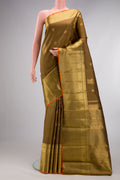 Pure Silk Pure Zari Mehandi Green Kanjivaram Saree with Zari Butta on the body and Zari Border.  displayed on a mannequin