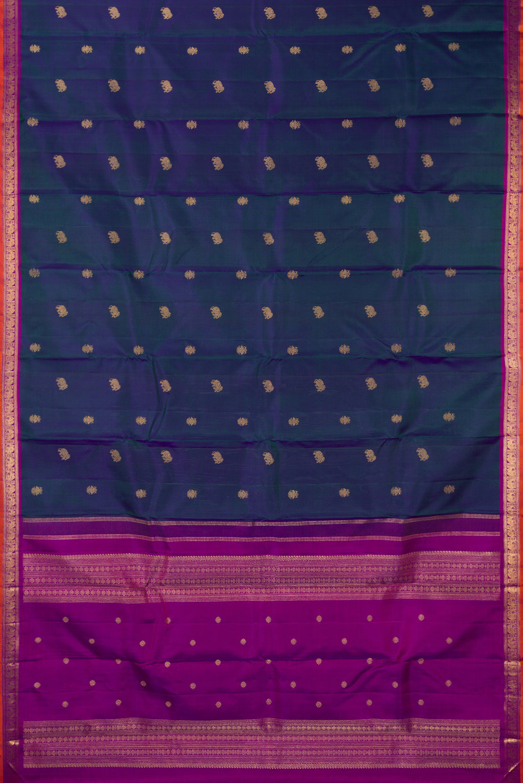 Flat view of Pure Silk Pure Zari Peacock Blue Dual Tone Kanchipuram Saree with Zari Butta on the body and Zari Border. 